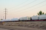 QTTX & KRL Flat cars with load in the yard